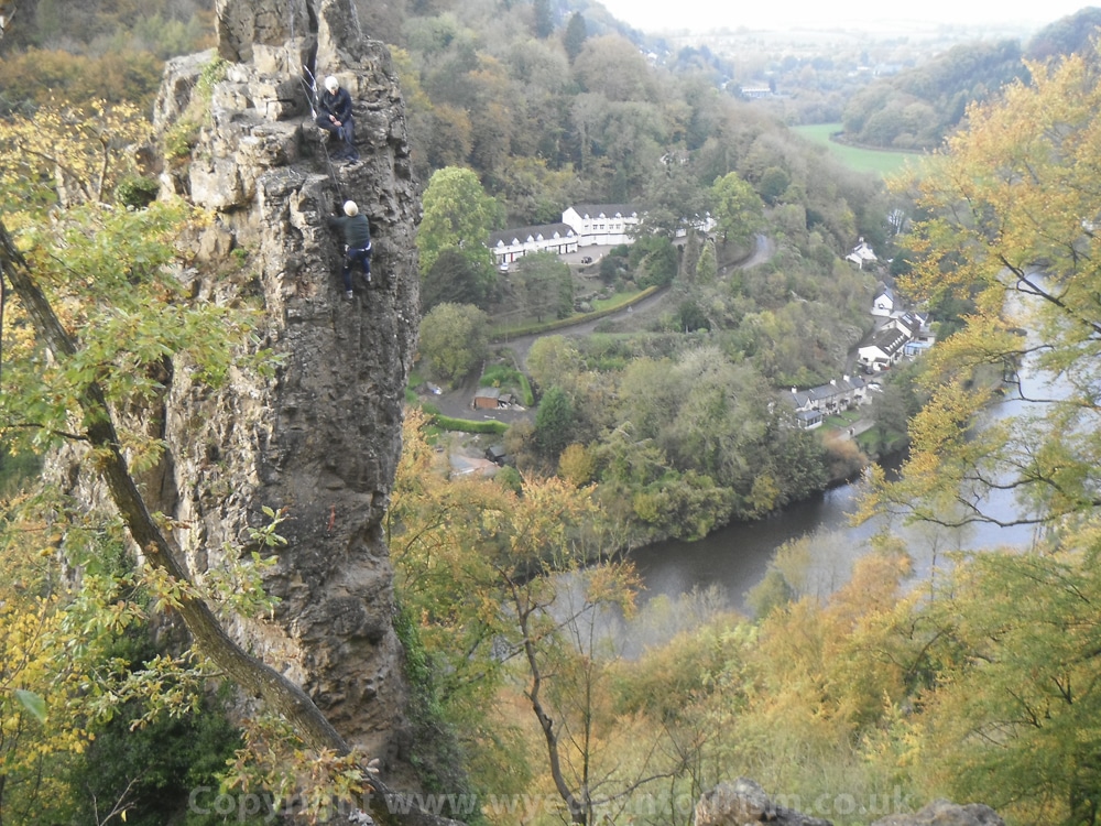 Climbing the long stone at Symonds Yat