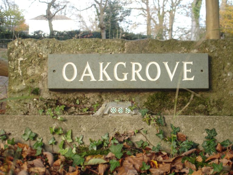 Oakgrove holiday cottage welcome sign