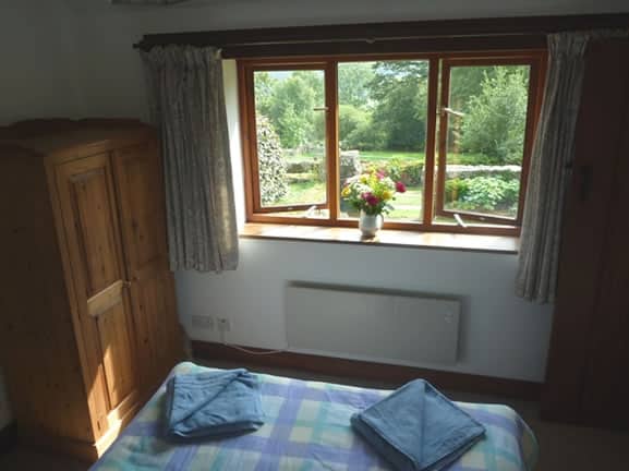 Stunning woodland views from Oakgrove Cottage bedroom